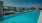 rooftop pool with planters and a view of washington dc at j sol arlington luxury apartments