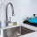 Gooseneck Faucet With White Backsplash At J Sol Apartments In Arlington, VA