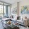 living area with sofa, side tables, coffee table, floor to ceiling window and modern artwork at j sol
